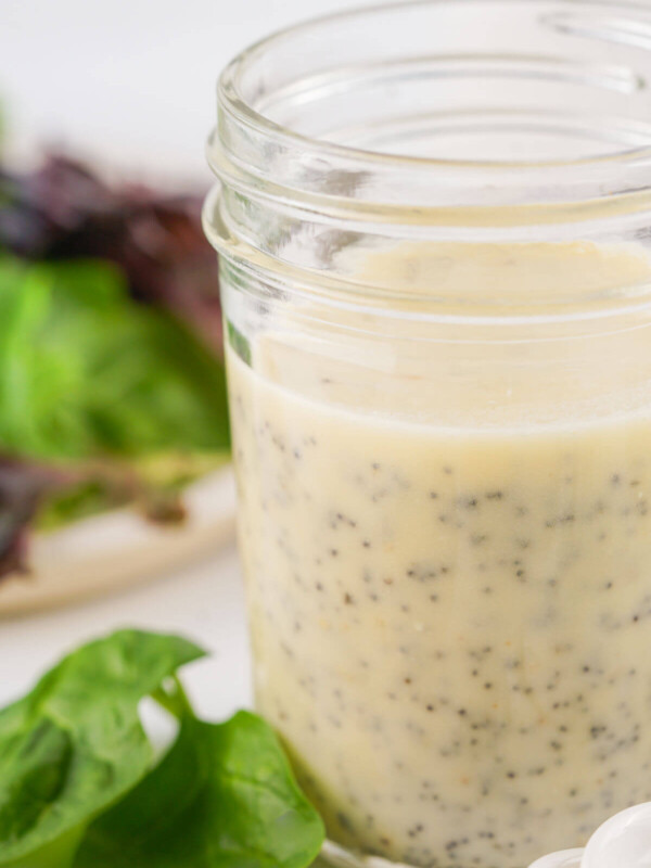 Homemade poppy seed dressing in a jar.