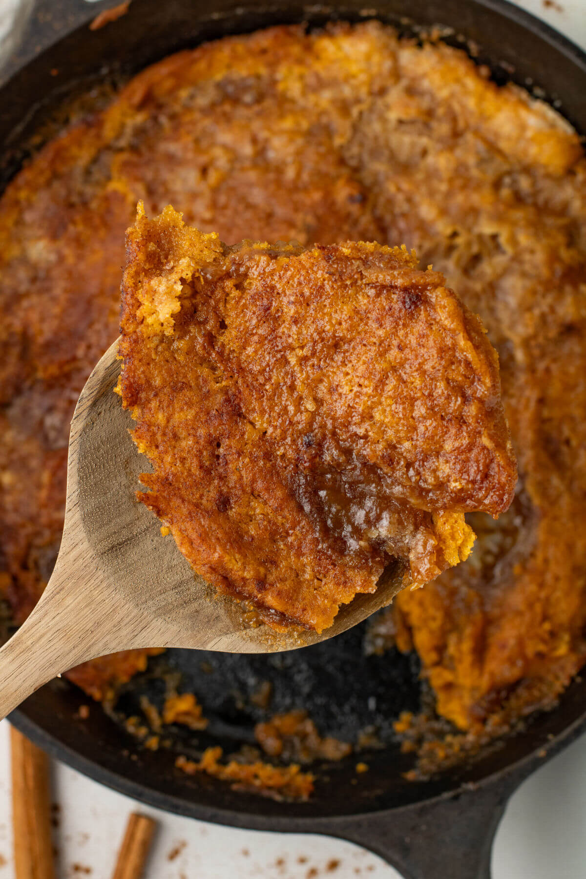 A scoop of Skillet Pumpkin Cobbler.