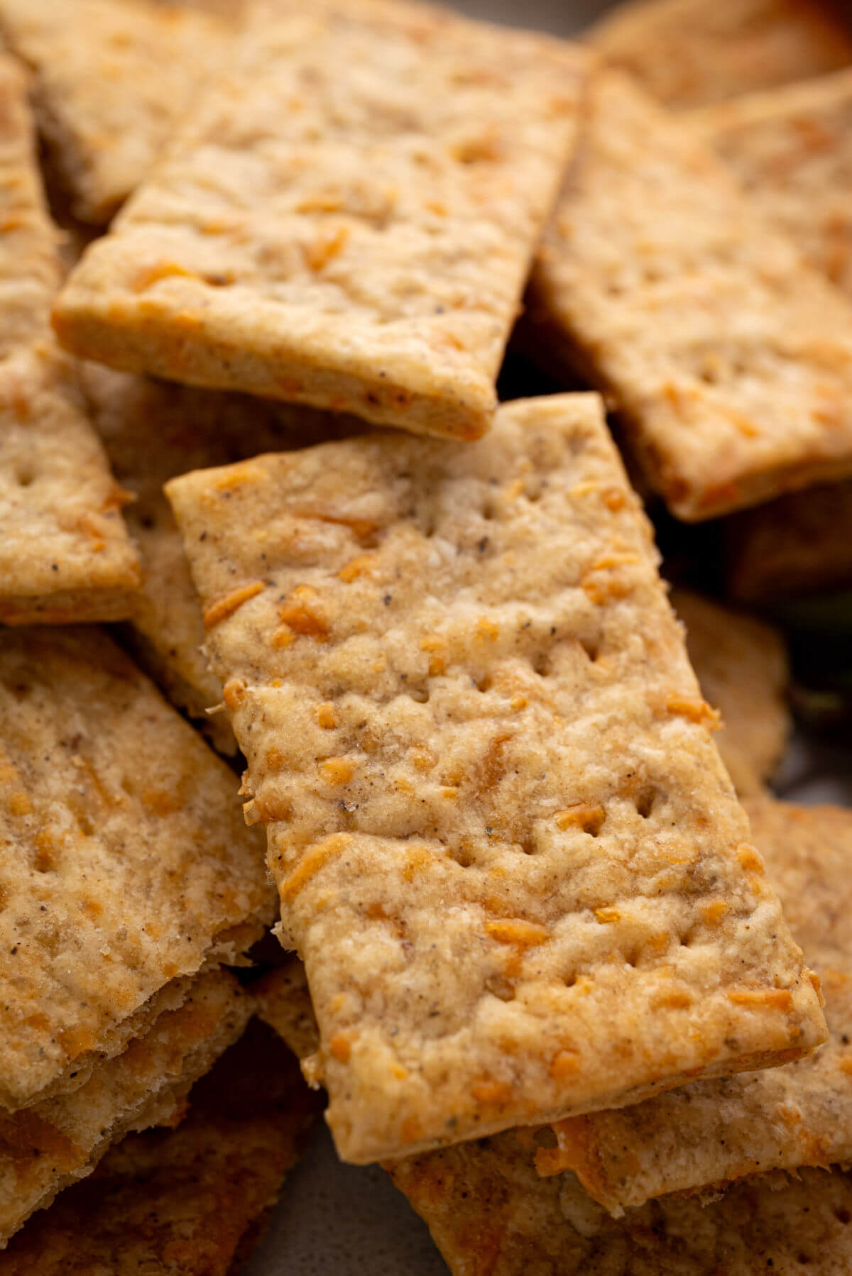 Sourdough discard crackers in a pile after baking.