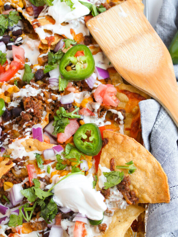 Sheet pan beef nachos on a baking sheet.