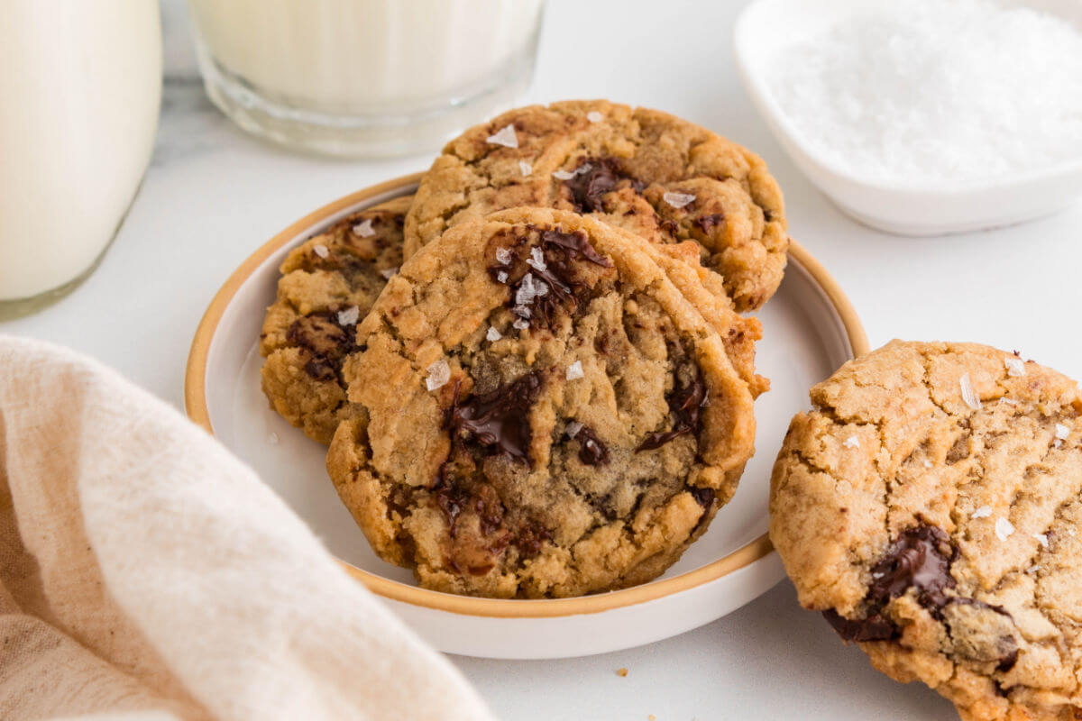 A plate of brown butter sourdough chocolate chip cookies.