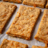 Sourdough discard crackers on a baking sheet.