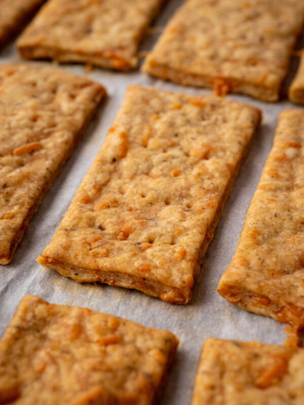 Sourdough discard crackers on a baking sheet.