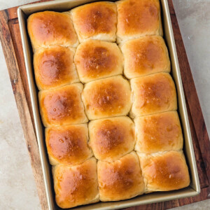 Pan of sourdough discard Hawaiian rolls after baking.