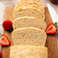Sourdough English muffin bread cut into slices.