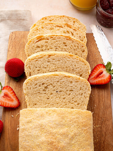 Sourdough English muffin bread cut into slices.