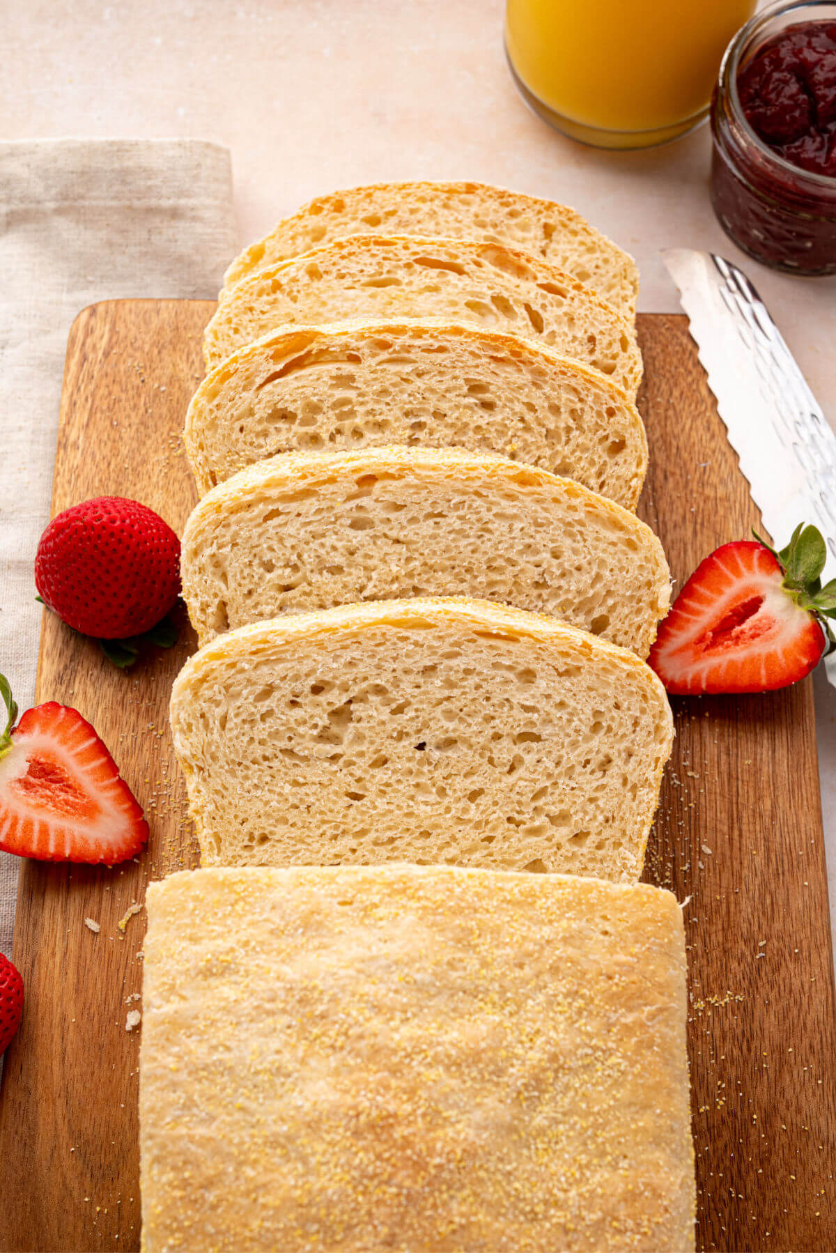 Sourdough English muffin bread cut into slices.