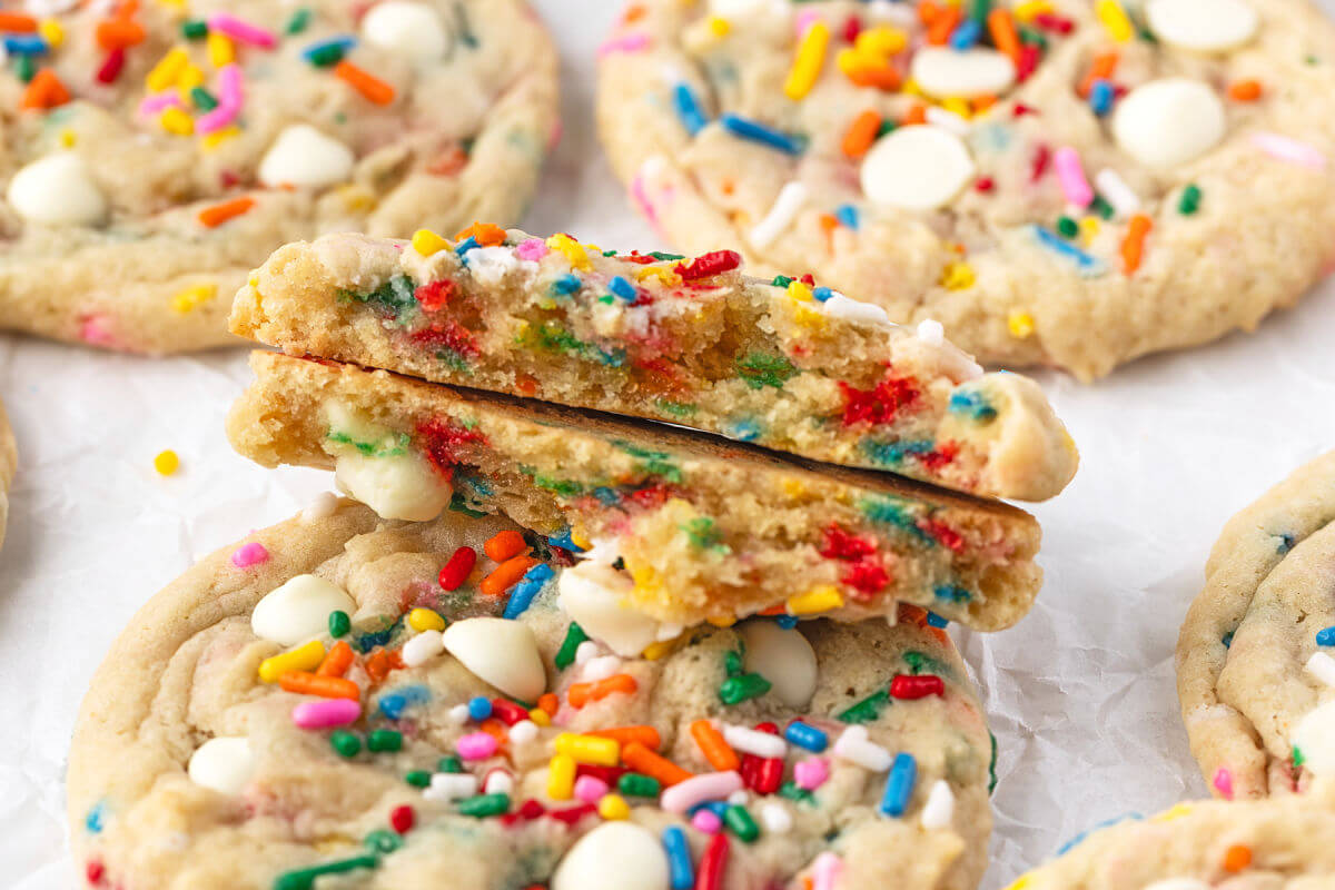 Sourdough Funfetti cookies cut in half to show moist inside.