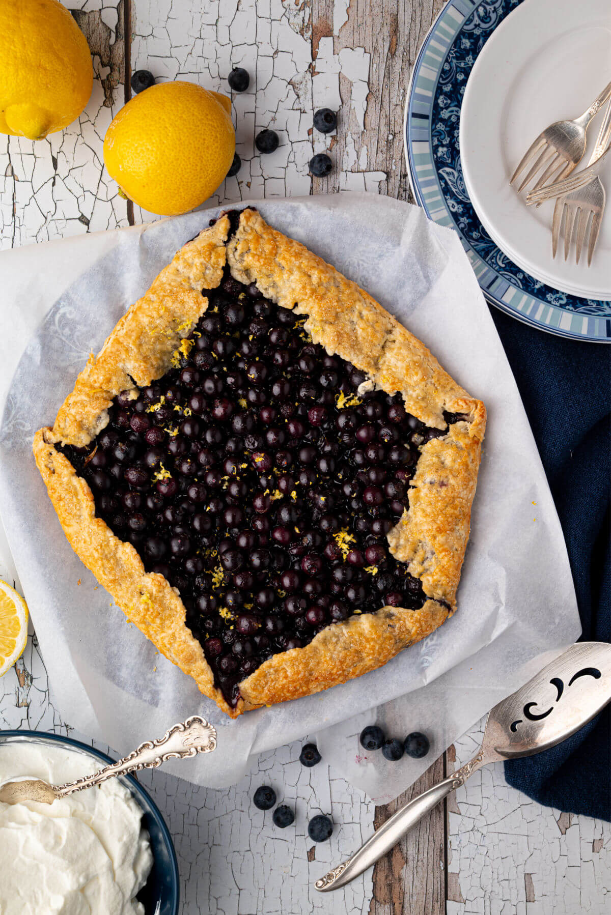 Blueberry sourdough galette recipe on parchment paper.