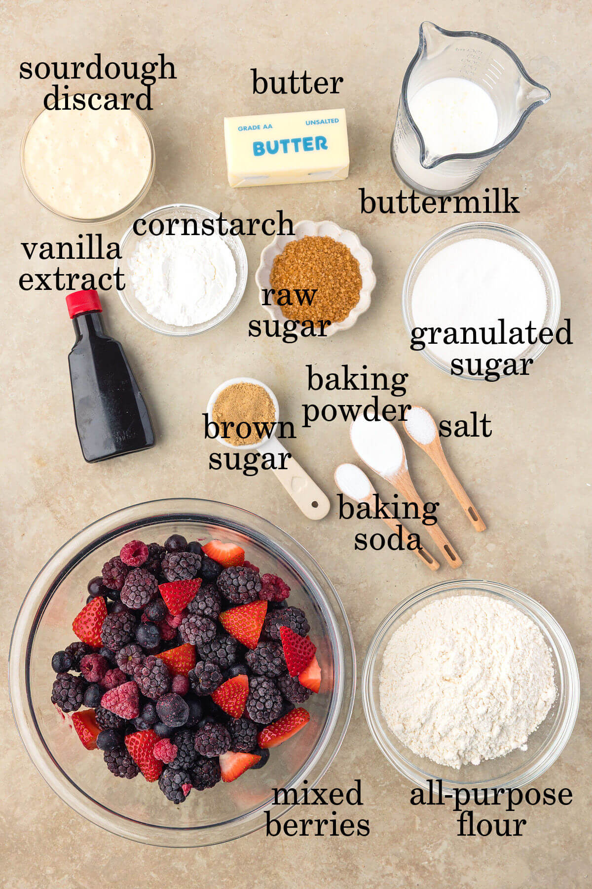 Ingredients for sourdough mixed berry cobbler in small bowls.