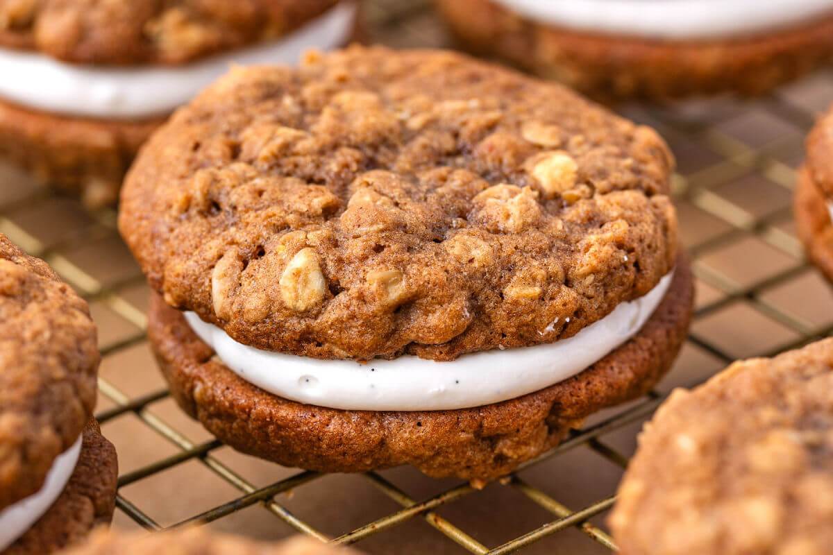 Sourdough oatmeal cream pies on a cooling rack.