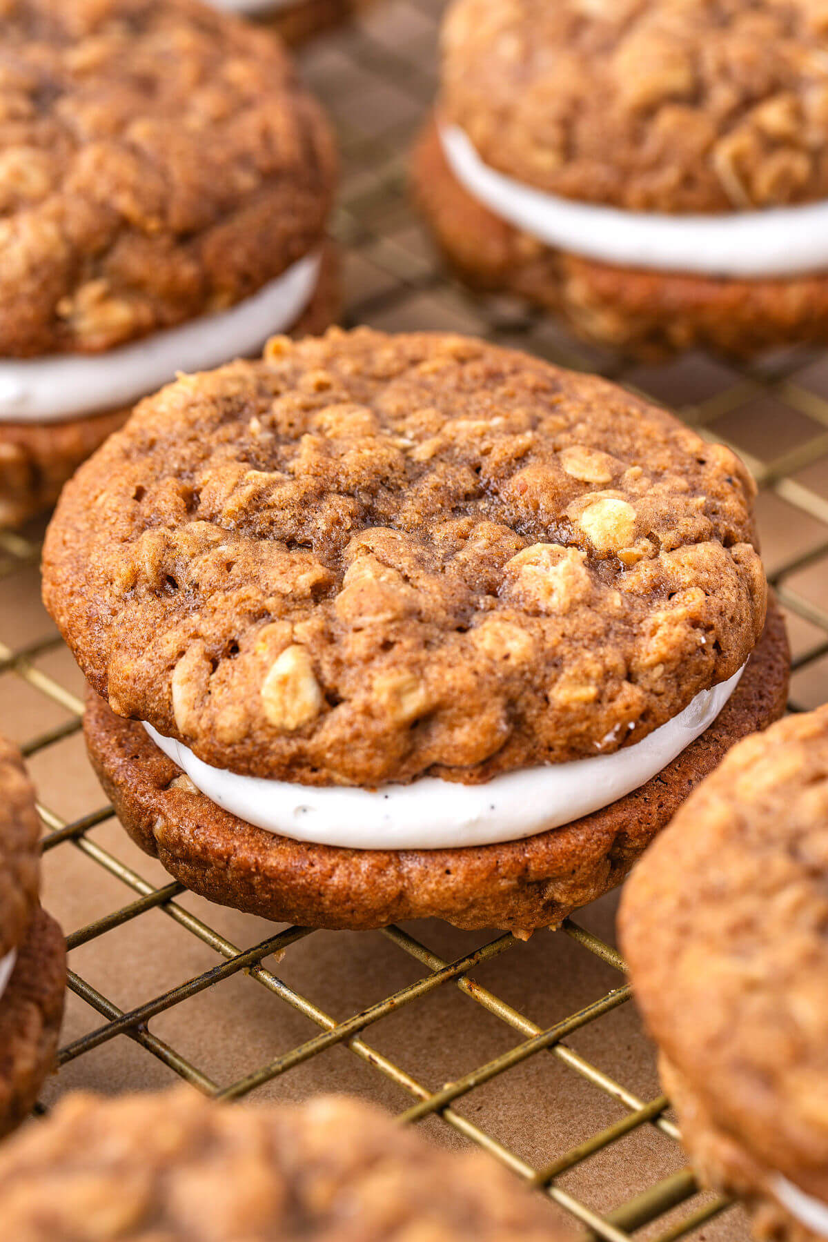 Sourdough oatmeal cream pies on a cooling rack.