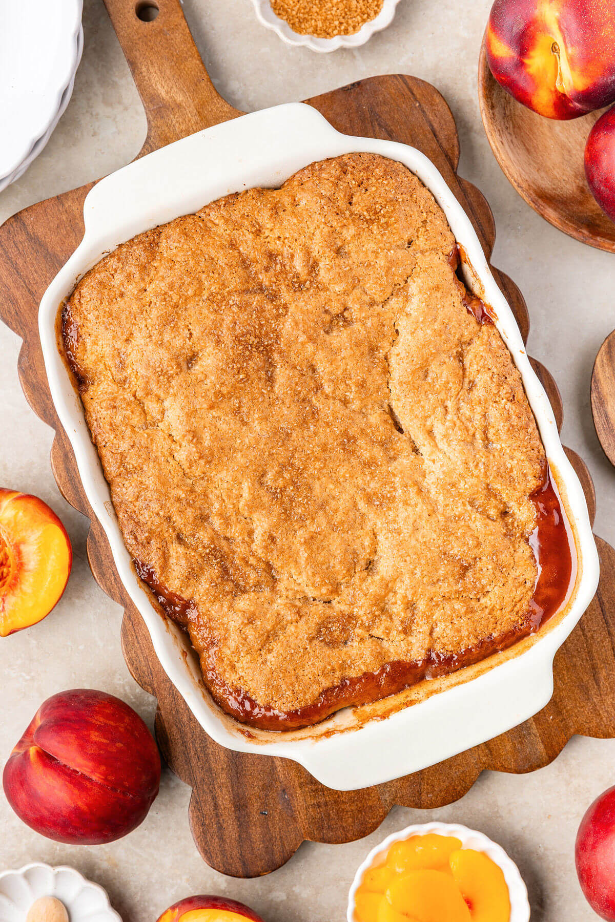 Sourdough peach cobbler in a baking dish.