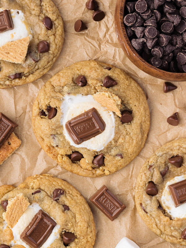 Sourdough s'mores cookies on a piece of parchment paper after baking.
