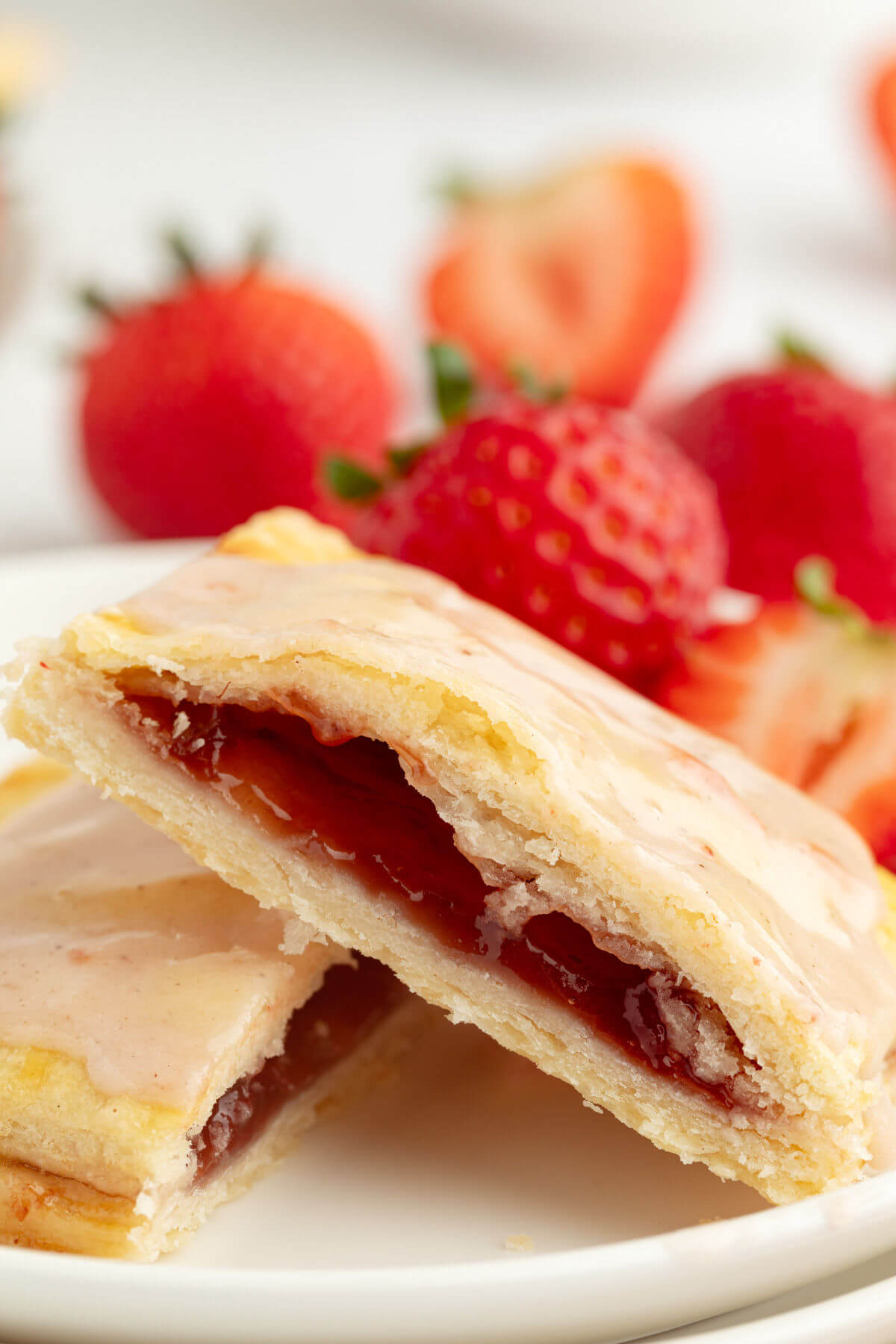 Sourdough pop tarts on a  plate with strawberries.