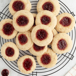 Sourdough thumbprint cookies on a cooling rack.