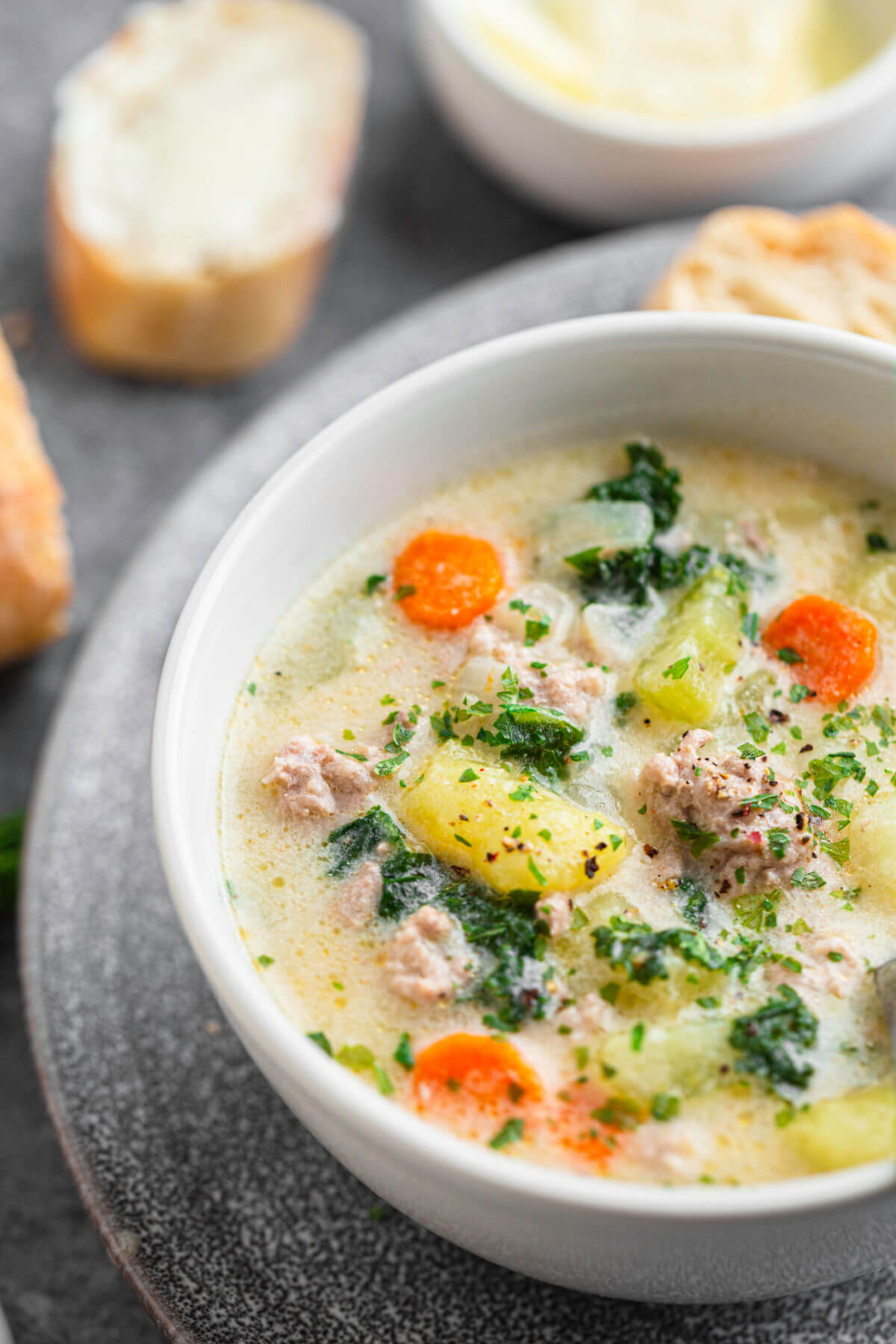 a bowl of kale sausage soup