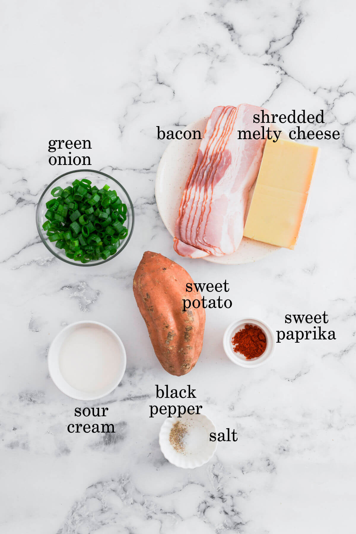 Twice baked sweet potatoes ingredients with labeled text overlay labeling each ingredient.