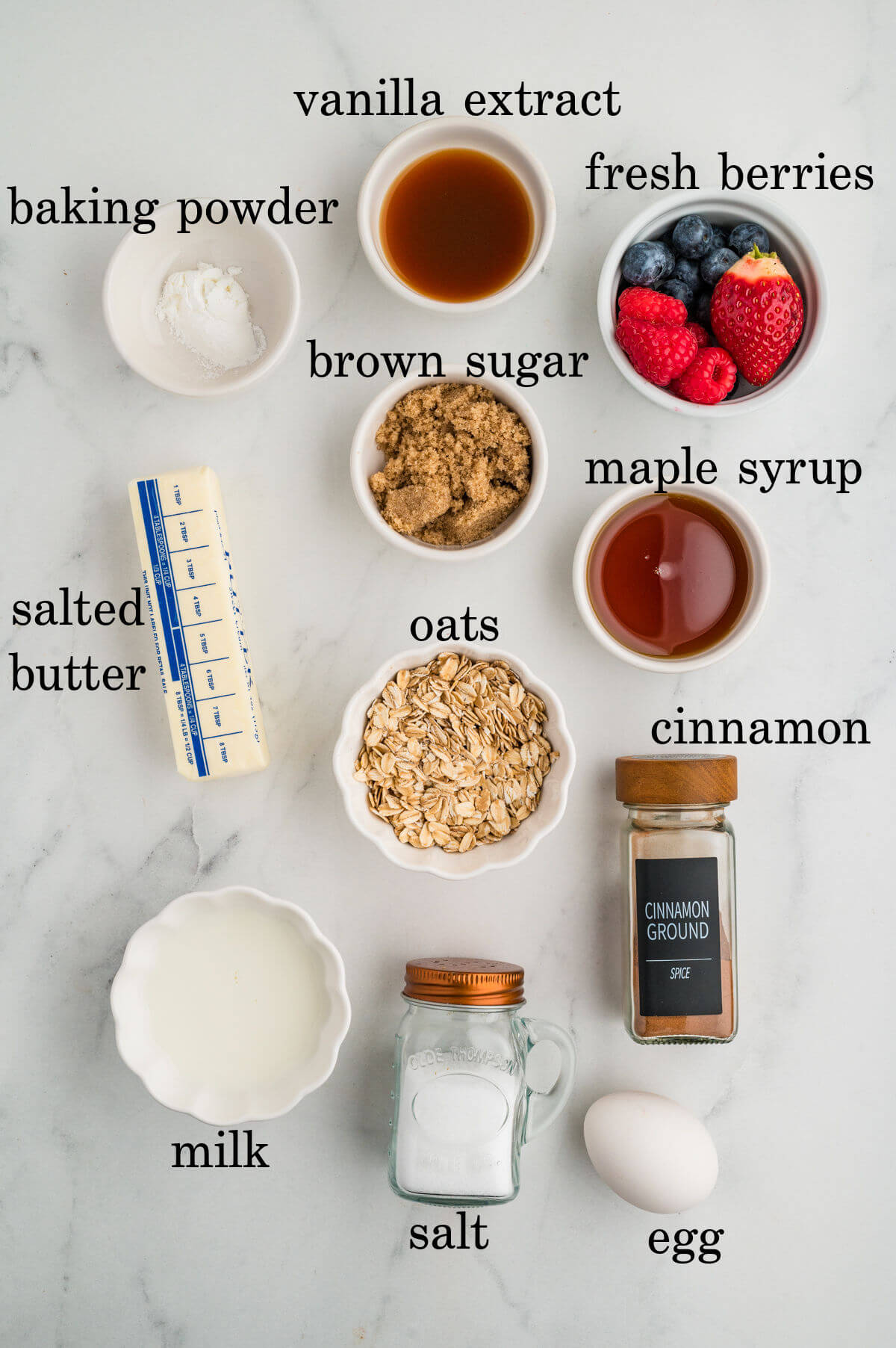 Ingredients in small bowls with text overlay labeling each ingredient.
