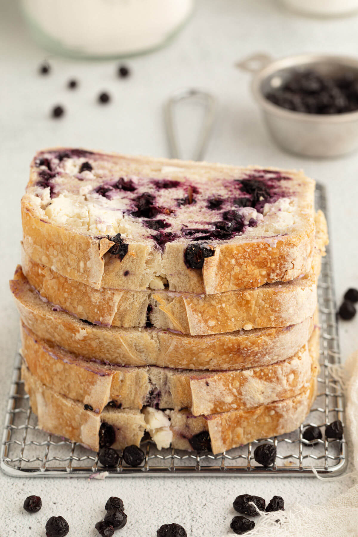 stack of sliced blueberry cream cheese sourdough bread
