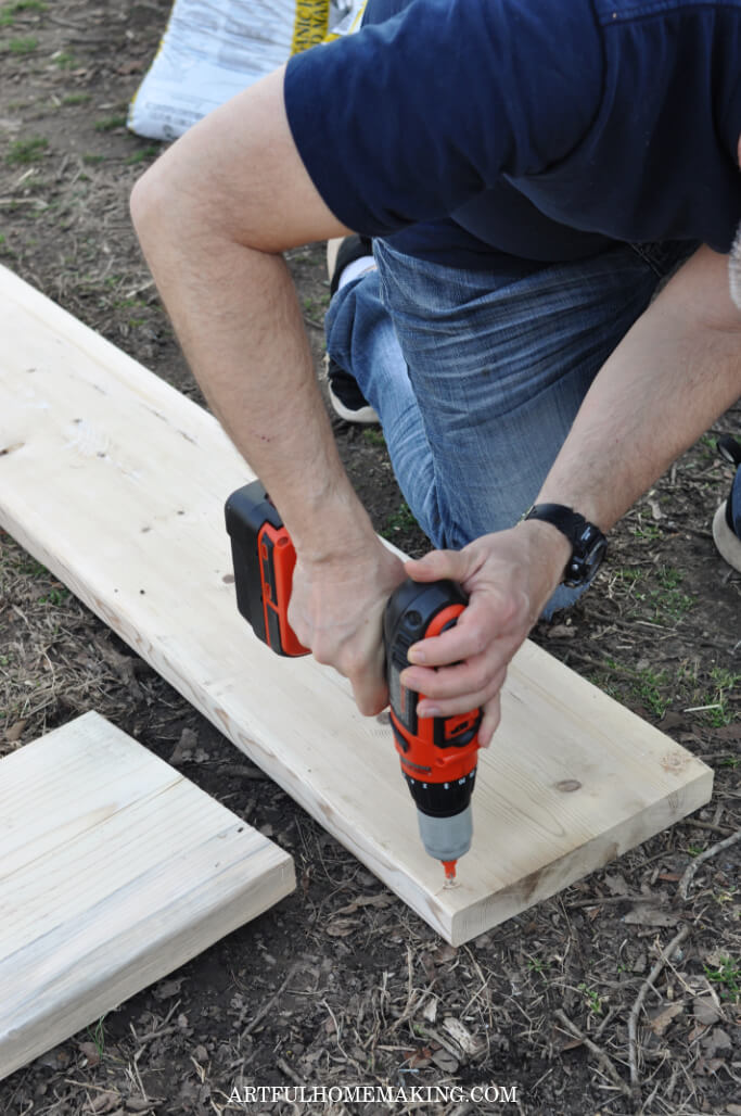 drilling holes for raised bed