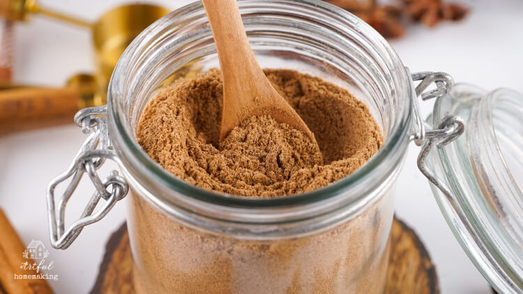 a glass jar containing chai spice mix