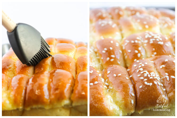 adding butter to the tops of the hawaiian rolls after cheeseburger sliders are baked