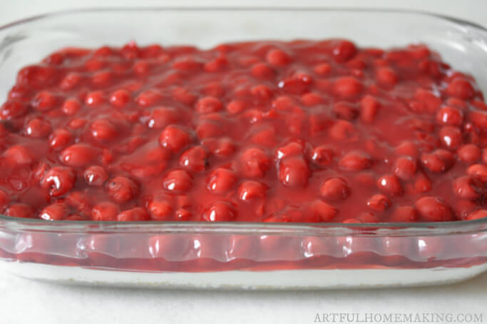 glass baking dish with cherry dessert