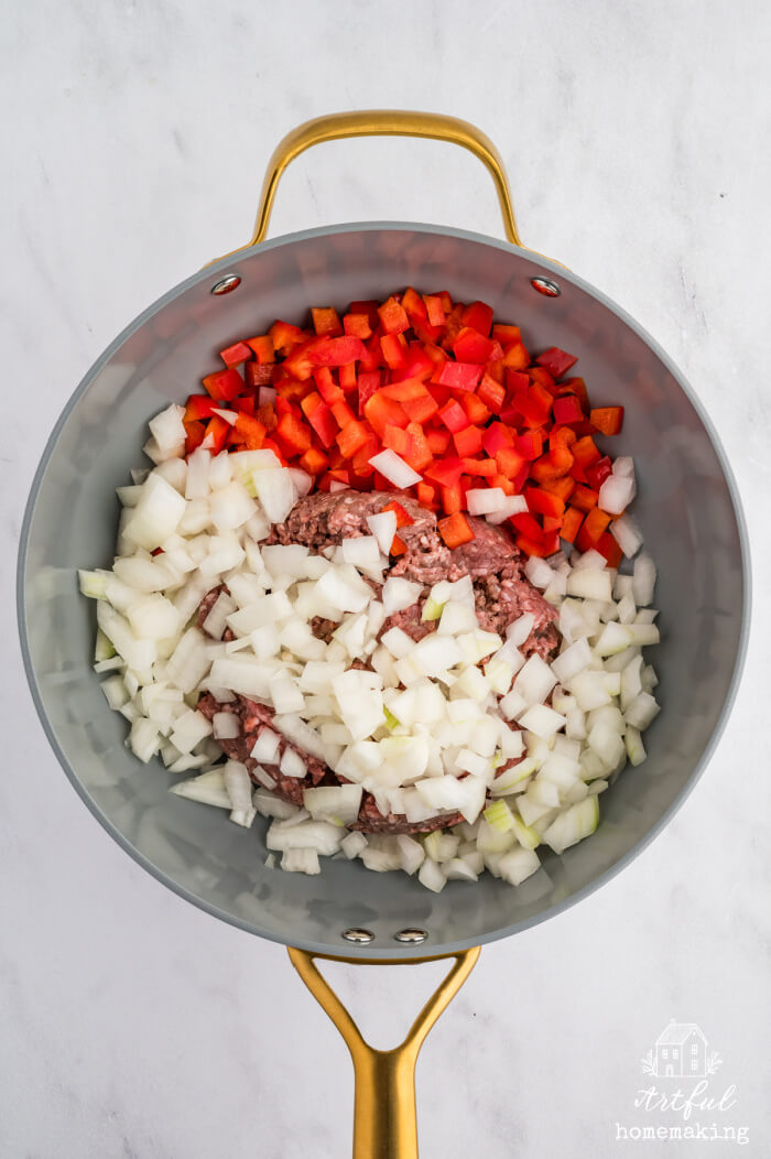 skillet with ground beef, onions, and peppers