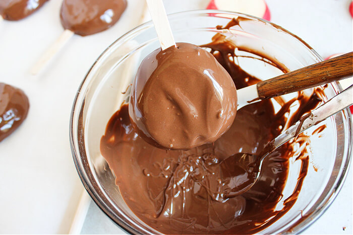 dipping apples in chocolate
