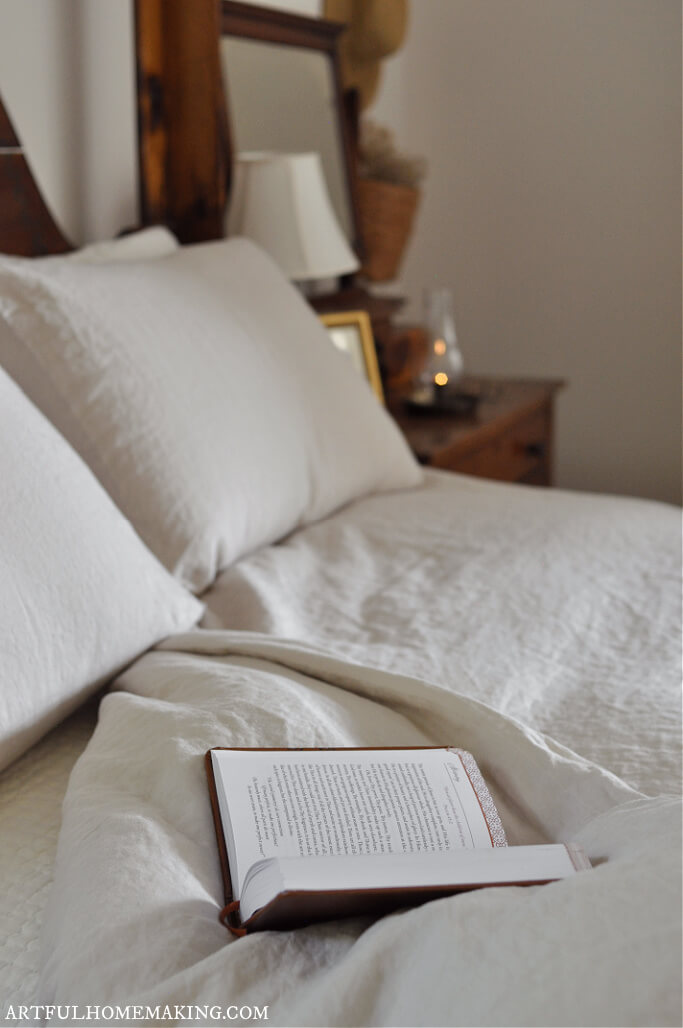 bed with open book