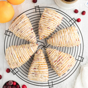 sourdough cranberry orange scones on a cooling rack