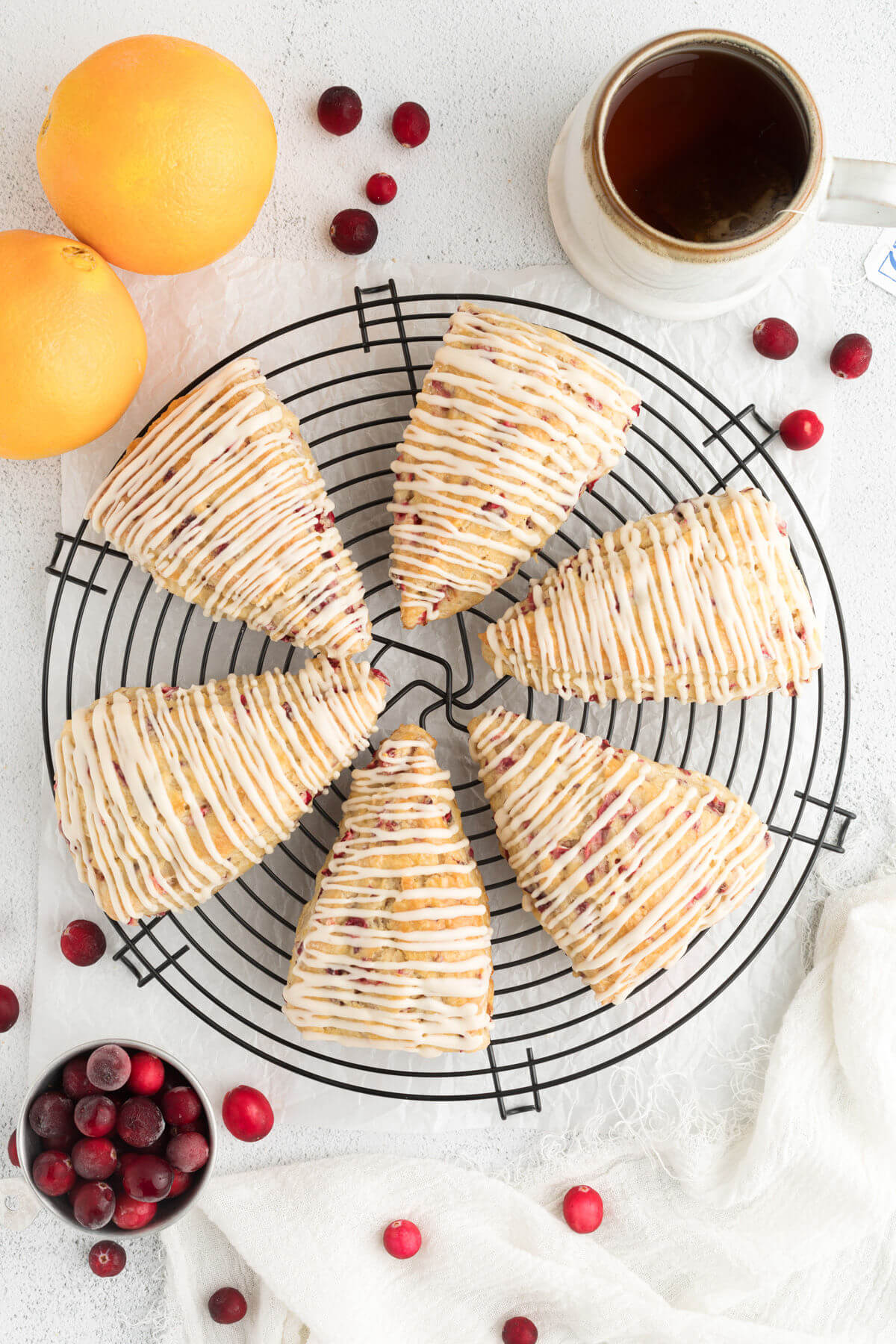 sourdough cranberry orange scones on a cooling rack
