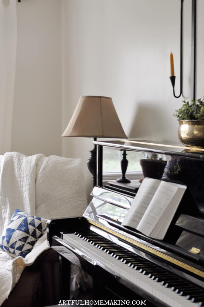 living room piano and chair