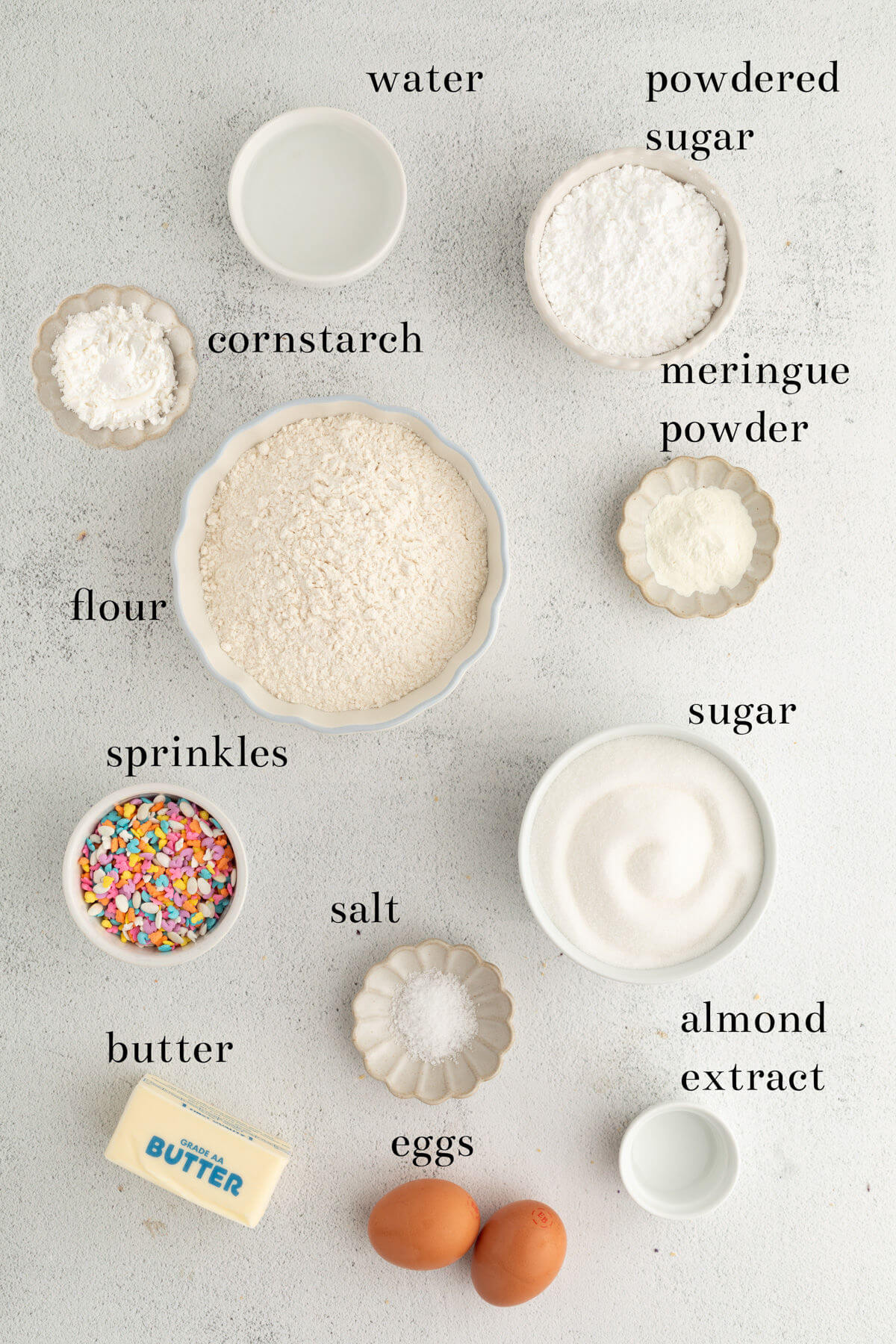 top down view of recipe ingredients in small white bowls