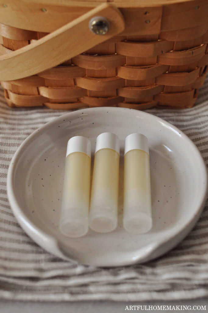 beeswax lip balm recipe in lip balm tubes with lids on