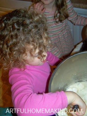 kids helping to make popcorn balls