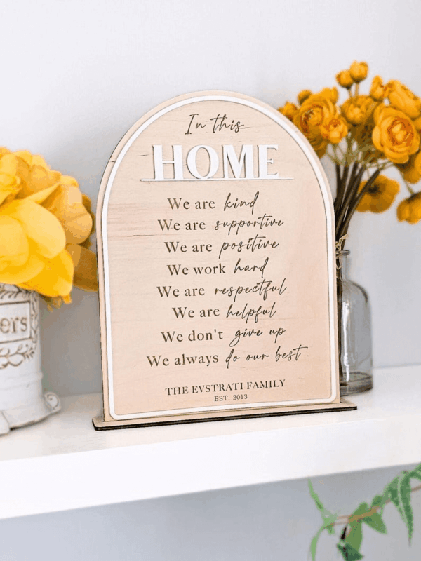 A personalized wooden family mission statement sign. 