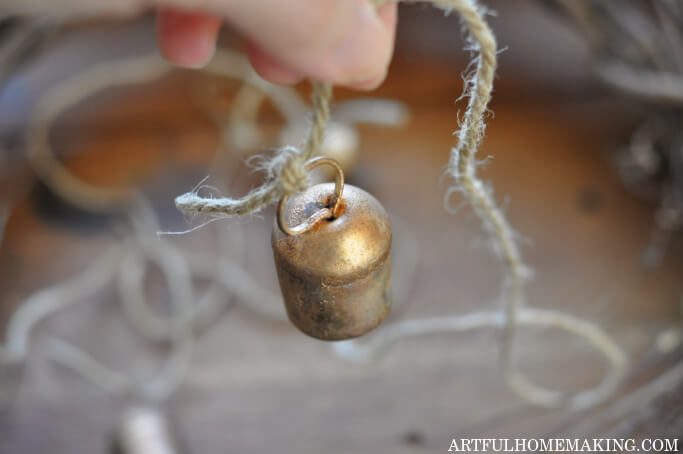 tying jute twine to a bell