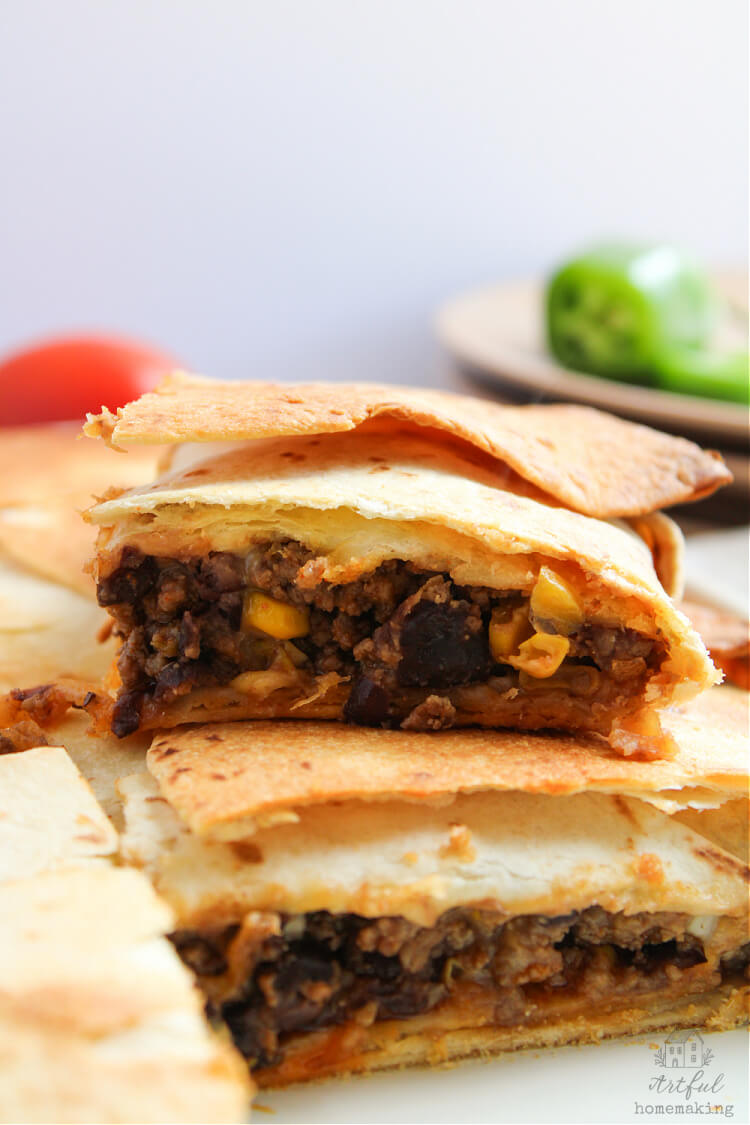 ground beef quesadillas cut into squares after baking