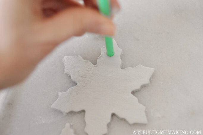 making hole in clay ornament