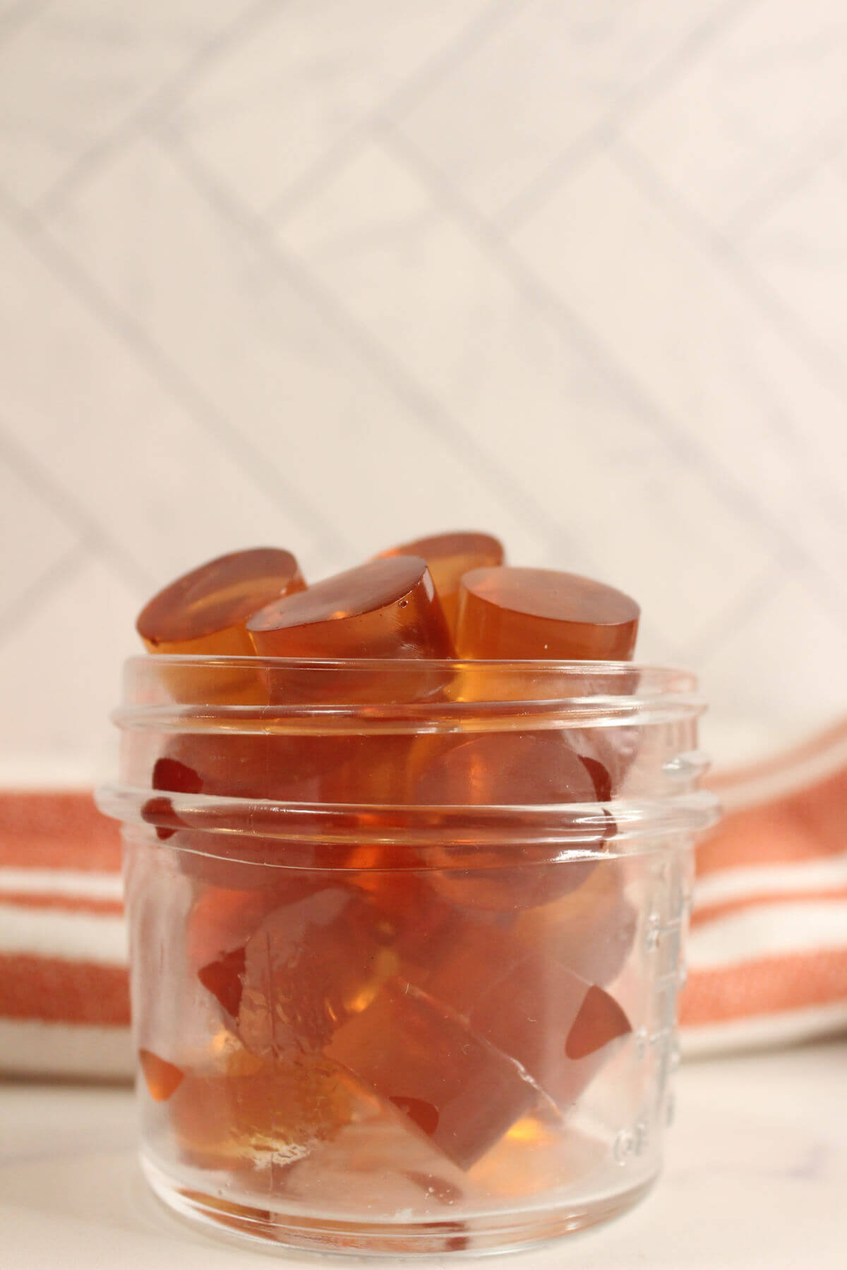 homemade healthy gummies in a clear glass jar