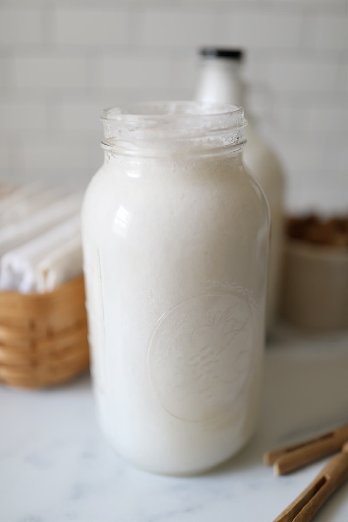 Homemade liquid laundry detergent in a half gallon jar.