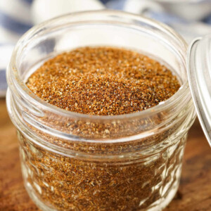 Homemade chili seasoning mix in a glass Mason jar.