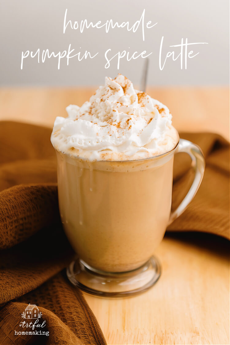 homemade pumpkin spice latte in a glass mug with whipped cream