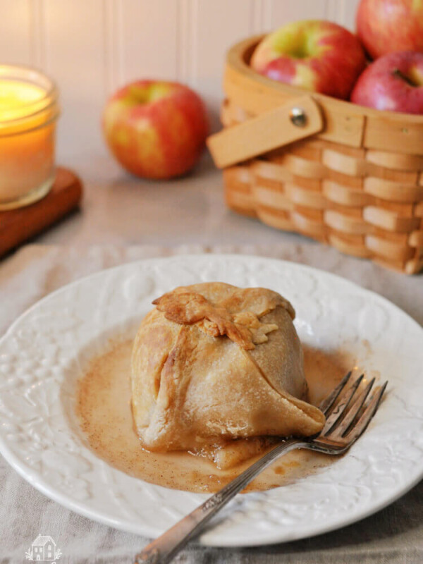 sourdough apple dumpling on a white plate
