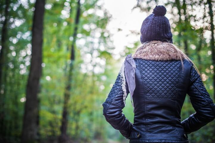 woman walking in woods