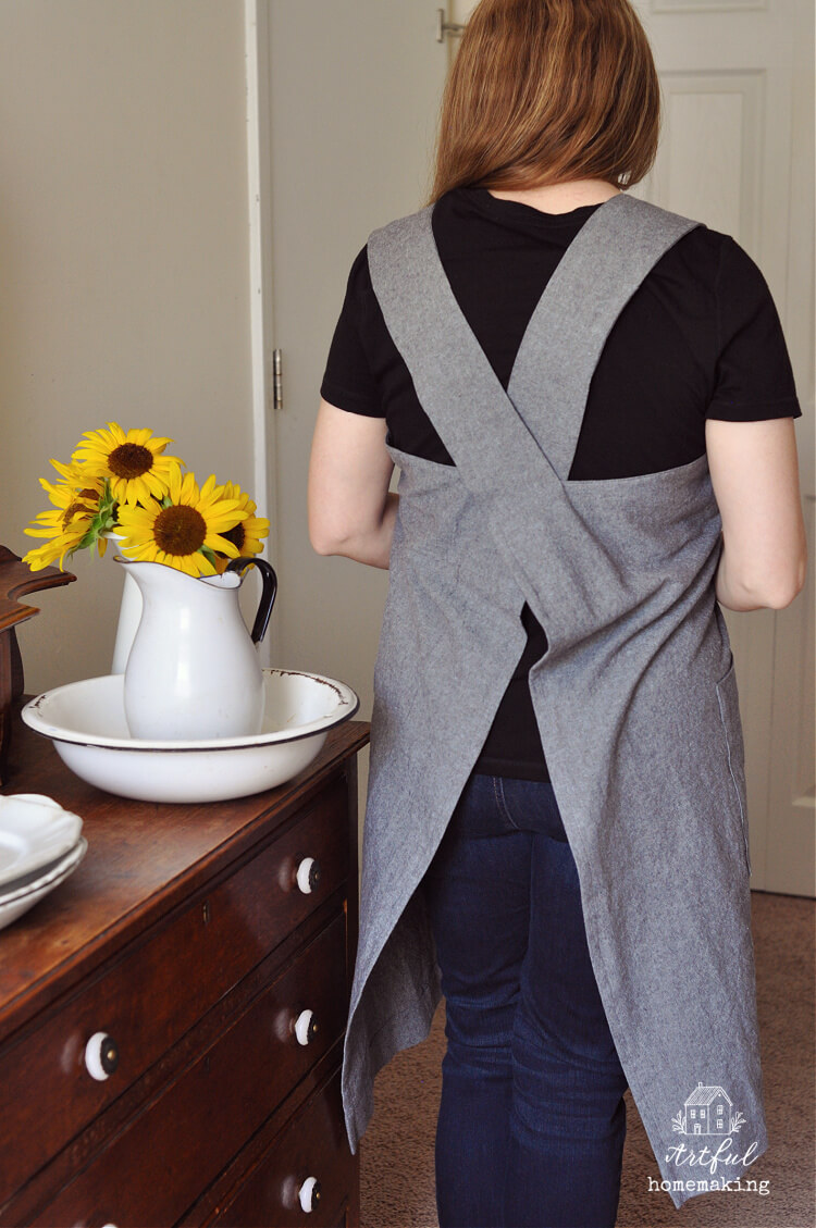 back of cross back apron on woman