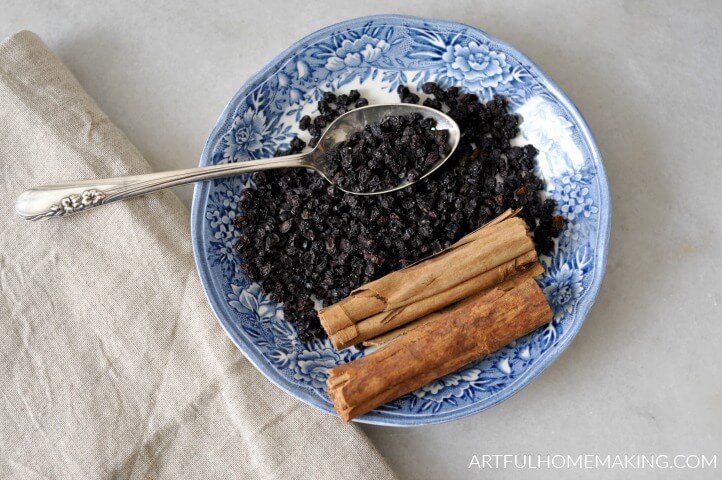 elderberries and cinnamon sticks