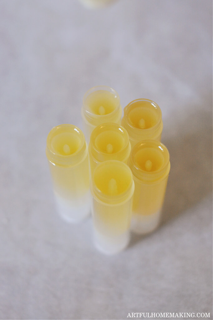 homemade lip balm poured into lip balm tubes